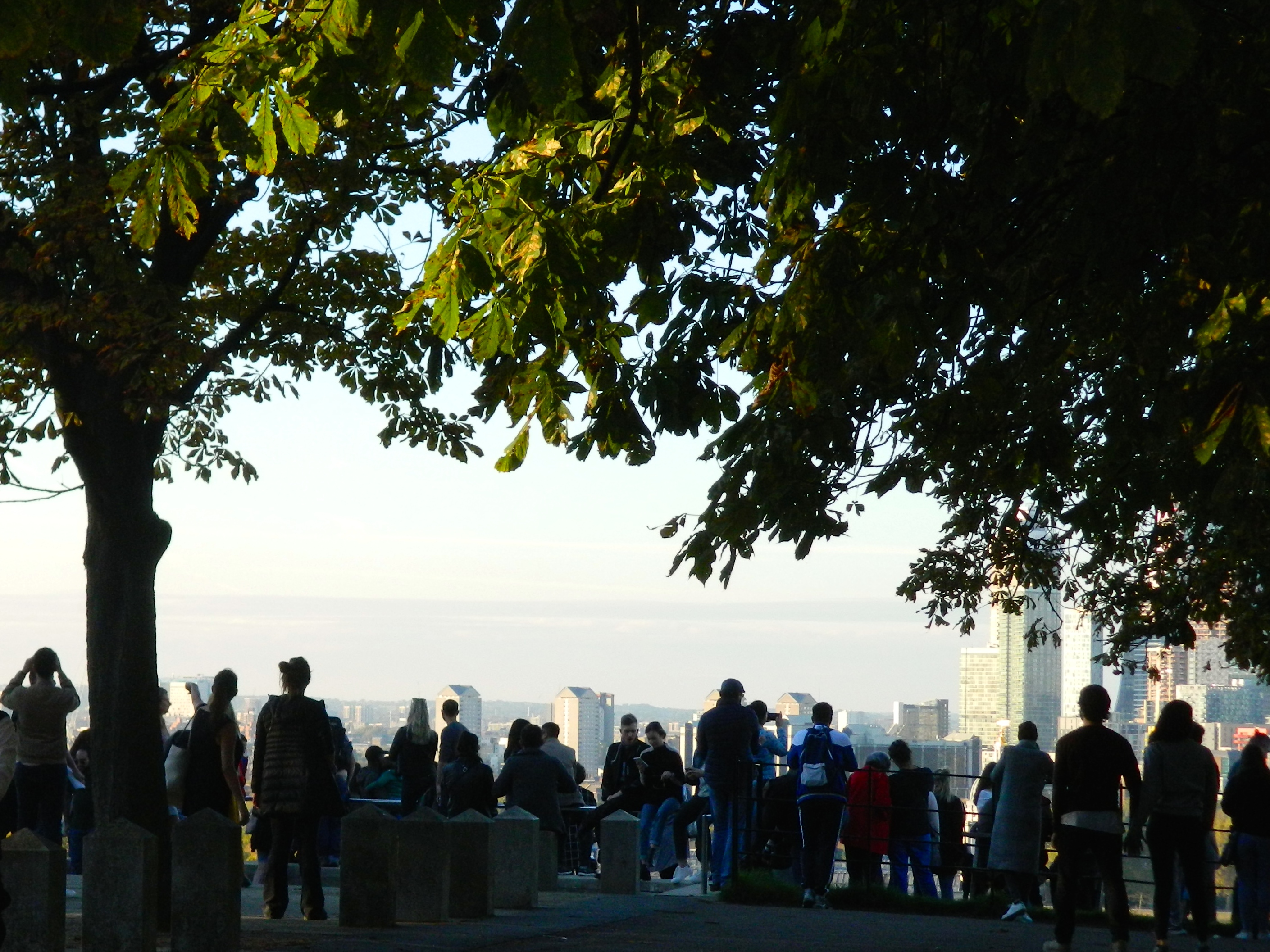 Crowds take in the view in Greenwich Park